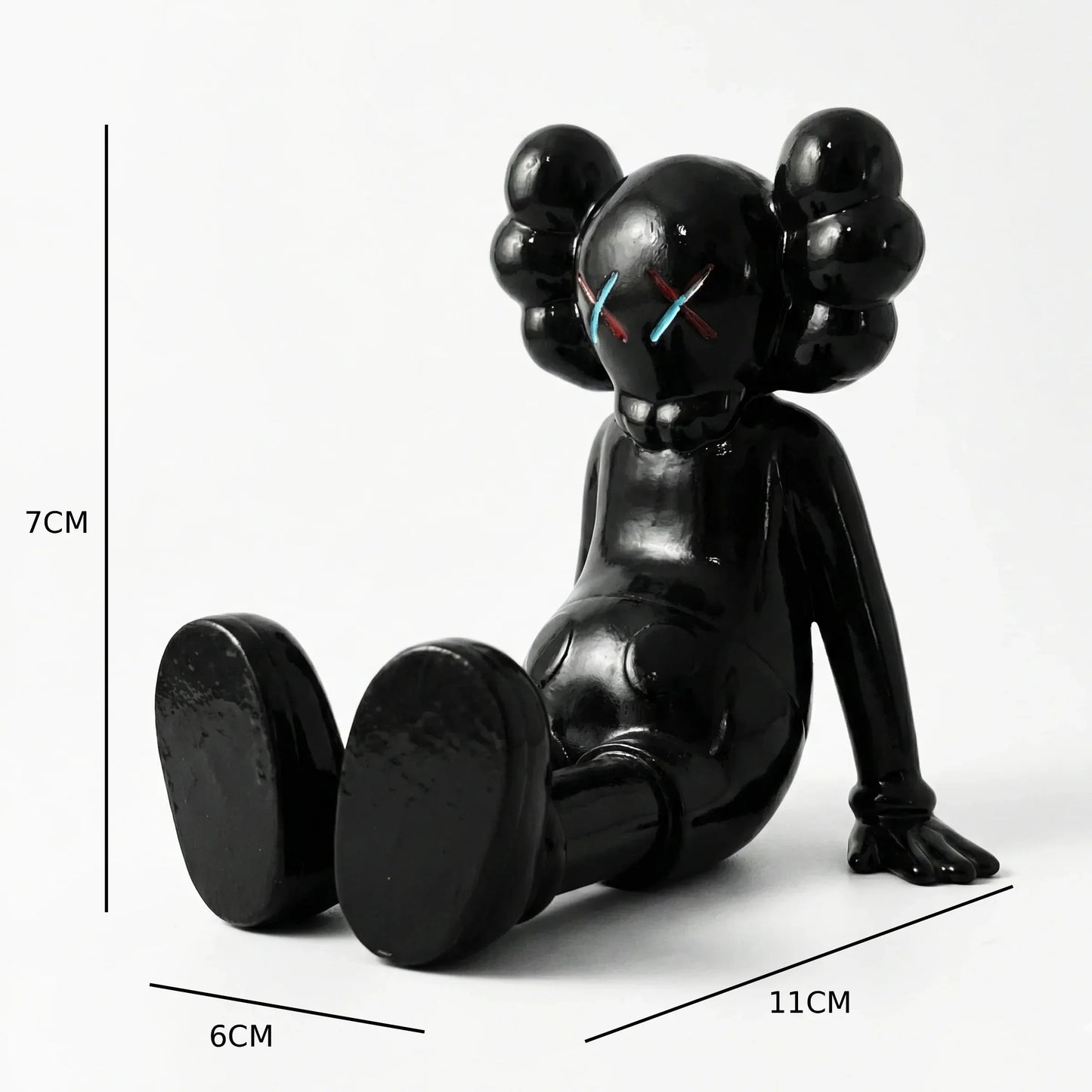 KAWS X Sitting Companion Miniature | Gloss Black Collectible | Archadia