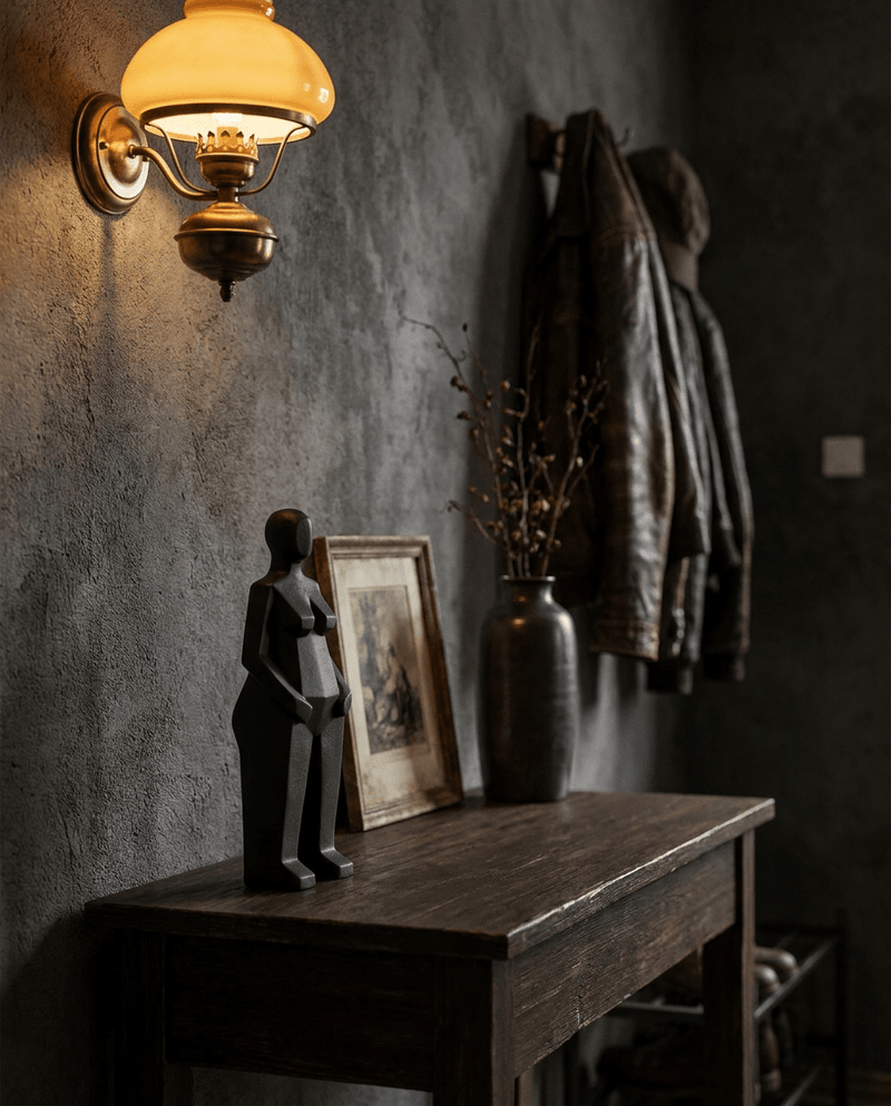 Handmade pop culture collectible sculpture on dark espresso console — Archadia Decors collector lifestyle