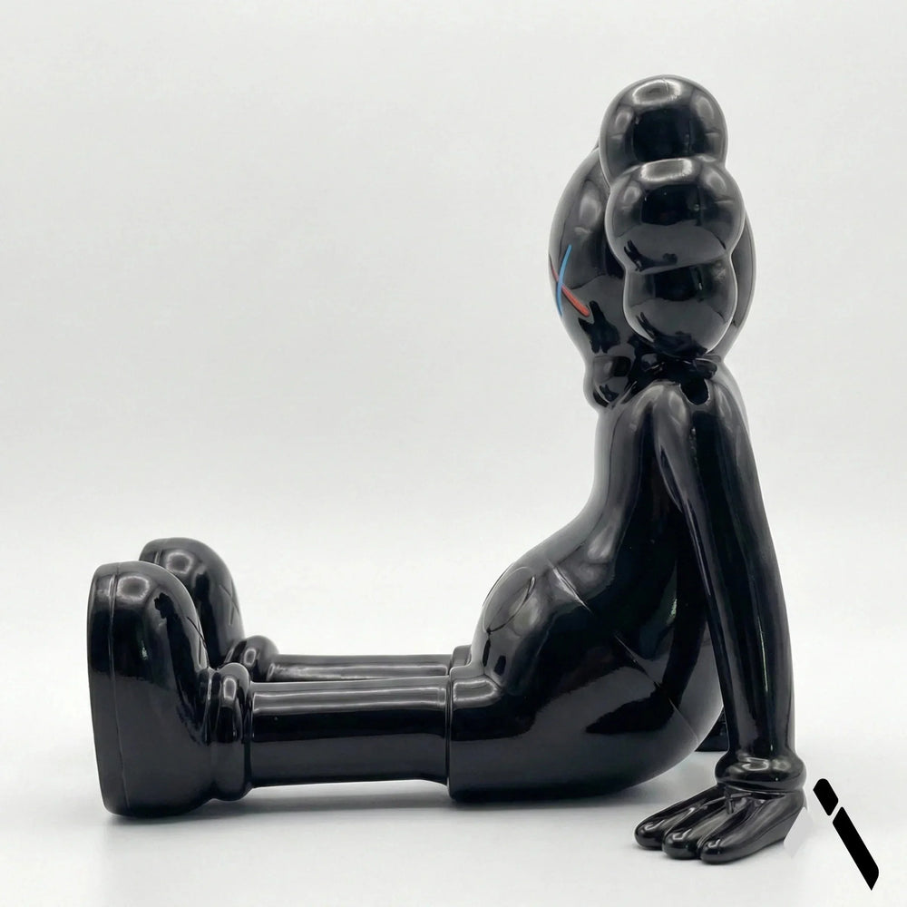 KAWS X Sitting Companion Miniature | Gloss Black Collectible | Archadia