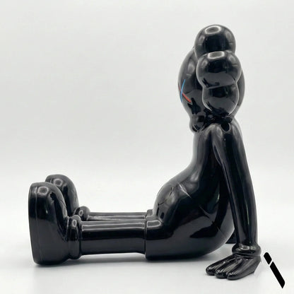 KAWS X Sitting Companion Miniature | Gloss Black Collectible | Archadia