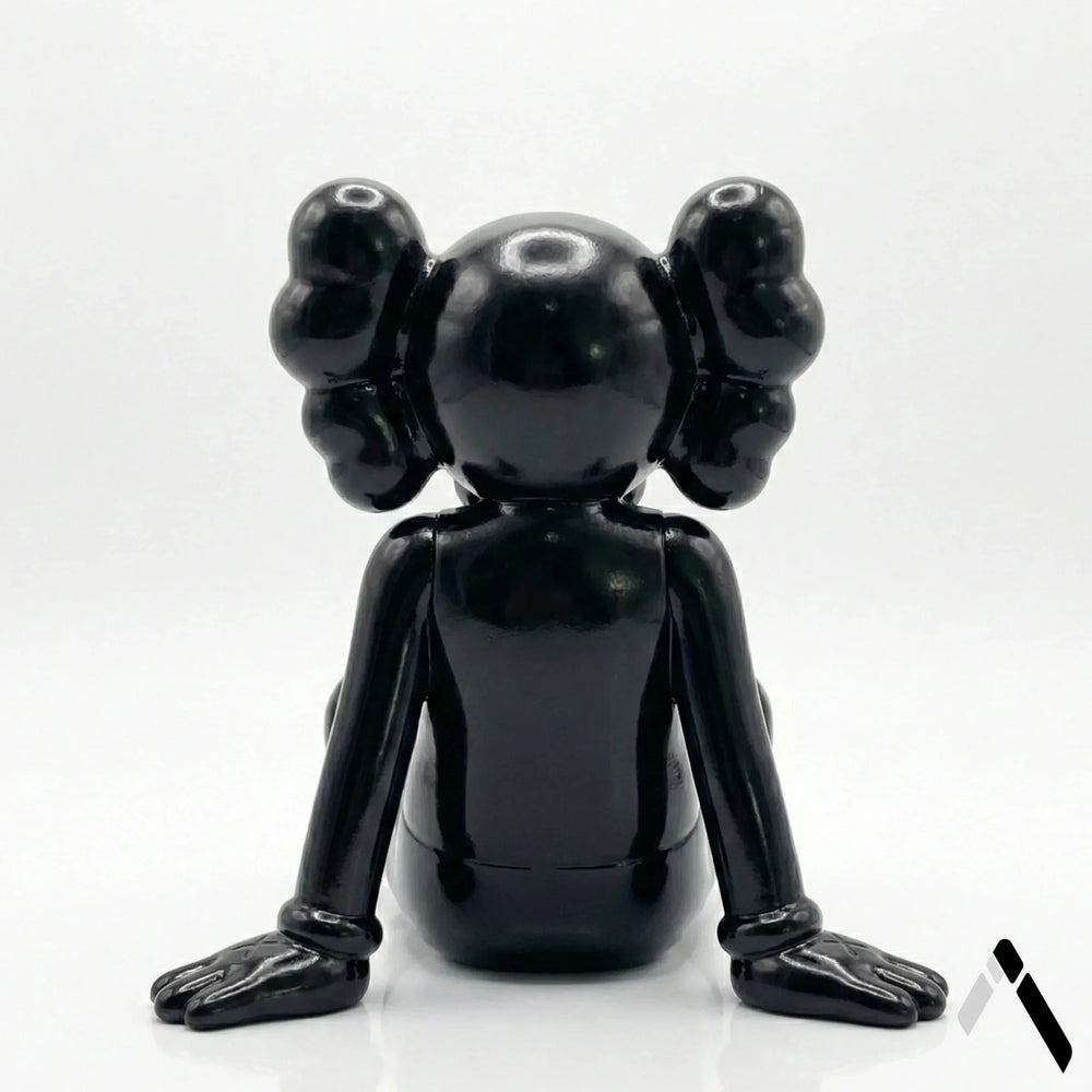 KAWS X Sitting Companion Miniature | Gloss Black Collectible | Archadia