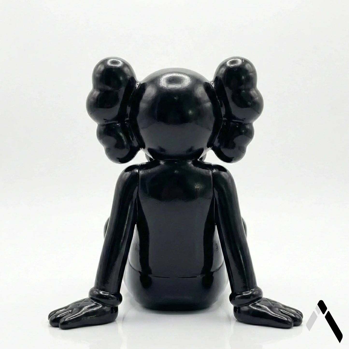KAWS X Sitting Companion Miniature | Gloss Black Collectible | Archadia