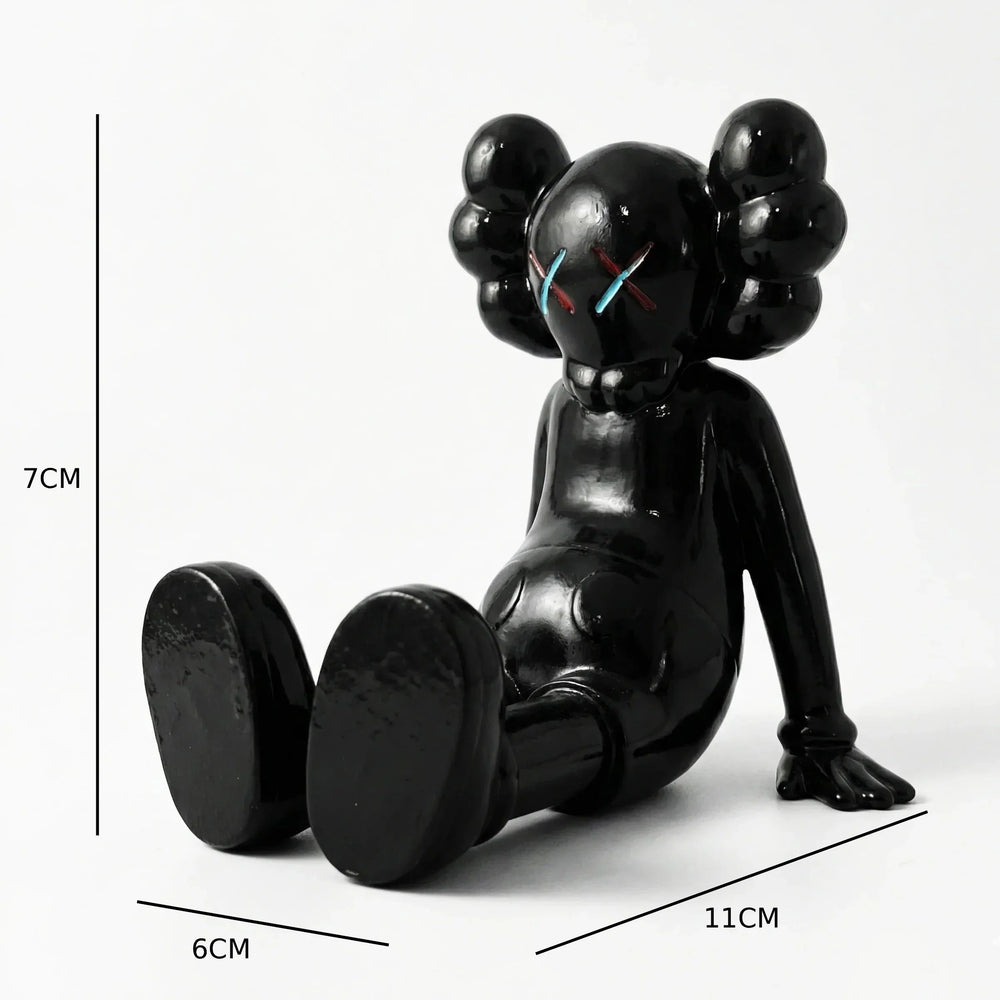 KAWS X Sitting Companion Miniature | Gloss Black Collectible | Archadia
